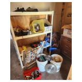 Tarp, battery charger, plumbing supplies, shelf,