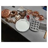 Metal molds, mini cupcake pans, hot dog rolling