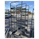 E1. Large metal bin rack cart