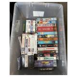 Large lot of VHS Tapes in tote some sealed