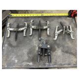 4 gear pullers (3 4" & 1 unknown)