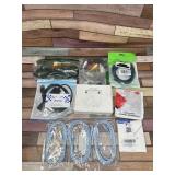 Lot of assorted cords/items for electronics.