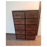 10 drawer cubby holder. Looks like wood but isn