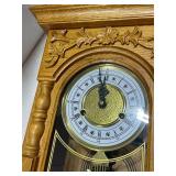 Vintage carved wood wall clock with key