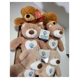 6 Teddy bears with tags.