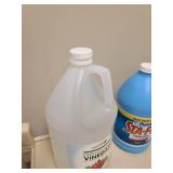 One gal. jug white vinegar, liquid starch, paper towel rolls