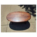 Wooden oval coffee table 46" W x 23" D x 18" H