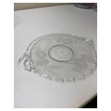 glass plate with small handles and roses