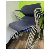 (4) Blue Stackable Chairs