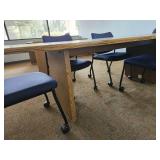 6 Person Wood Meeting Table And 7 Rolling Blue Chairs