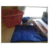 1 Heating pads, Weighted pad, diapers and small basket.