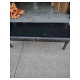 56 in wide 21 inches deep 16 in high early American style coffee table with two drawers