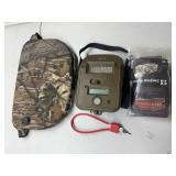 Mossy Oak Cushion, Moultrie Trail Cam, Beartooth Comb Raising Kit and Rifle Lock with Keys