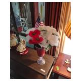 15 in tall plastic vase with white and red flowers and flag