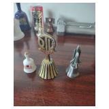 three mixed collectible bells