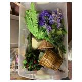 Tote of artificial flowers and baskets