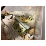 tote with contents, bird figurines, artificial flowers