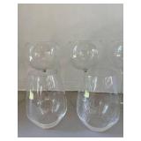 Five stemmed and two unstemmed wine glasses