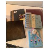 Photo albums and a llama journal and pen