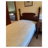 Twin size bed with post headboard (located upstairs)