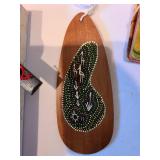 Handpainted Australian wooden bullroarer, square wooden dishes from Crate and Barrel, Japanese paddle fan decor, more