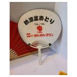 Handpainted Australian wooden bullroarer, square wooden dishes from Crate and Barrel, Japanese paddle fan decor, more