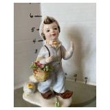 Vintage porcelain Dutch boy and girl with geese 5in tall and vintage bisque Charlotte dolls