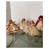 4 Storyville dolls, no tags 2 in red 2 in peach