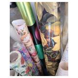 Rolls of gift wrap and tissue paper