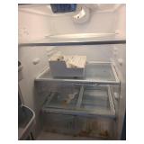 Frigidaire refrigerator 20.5 cu ft. , 69x31x37, works great, needs cleaned, in garage.