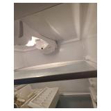 Frigidaire refrigerator 20.5 cu ft. , 69x31x37, works great, needs cleaned, in garage.