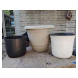 Assortment of plastic flower pots largest approx 16x19 inches