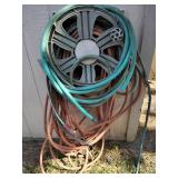 Bunch of cut Hoses for garden watering, hose reel not included