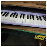 The ONE Smart Keyboard COLOR 61 Lighted Keys Piano Keyboard, Electric Piano for Beginners with 256 Tones, 64 Polyphony, Built-in LED Lights & Apps, Supports USB MIDI/Headphones (Purple) - Retail: $148