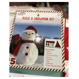 Childâs Stocking, Build a Snowman Kit, Bag of Snowflakes, and Four Mini Stockings