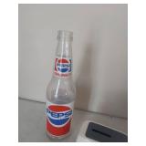 Pepsi bottles, can and bank