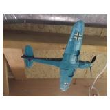 airplane models hanging in basement