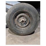 2 Trailer axles with tires, torsion springs, and