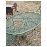 Oblong green expanded metal table with two chairs, 60 x 38