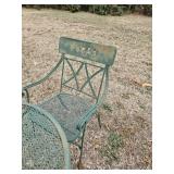 Oblong green expanded metal table with two chairs, 60 x 38