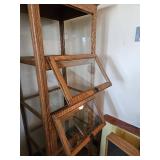 72x23x19 Oak glass front and side display cabinet. Has dropped front doors