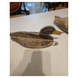 Three antique carved wood duck decoys