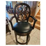 Bar height wood and black vinyl swivel Barstool, some wear