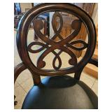 Bar height wood and black vinyl swivel Barstool, some wear