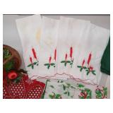 Lot of Christmas hand stitched dinner napkins , holiday basket , and doiley (1 set of napkins Stained)