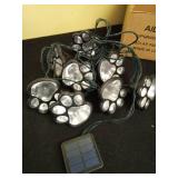 AIDDOMM 16.8ft Paw Print Solar Lights - Dog Cats Animal Solar String Lights (Set of 8) Outdoor Waterproof, Cat Puppy Animal DÃ©cor Walkway Lighting, Gifts for Pet Lovers (Cold White) Retail $27.49