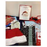 Extra Large Gift Bag, Three Bottle Gift Bags, Santa Hat, Large Gift Bag, Santa EMB Kit, Two Pkgs Gem Stickers, and Five Small Gift Bags