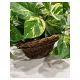 Wicker basket with faux greenery