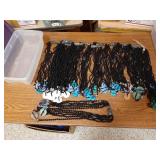 Approximately 70 necklaces with black glass jewelry beads