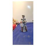 Ten inch woman porcelain statue